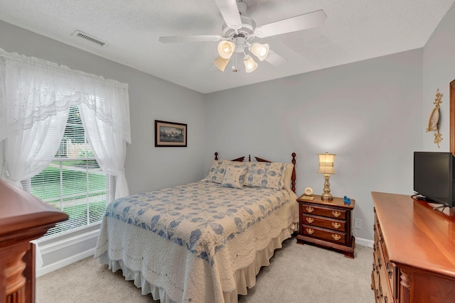 914 E Northfield Blvd, Murfreesboro, TN 37130 - bedroom with light colored carpet, a ceiling fan, and a textured ceiling