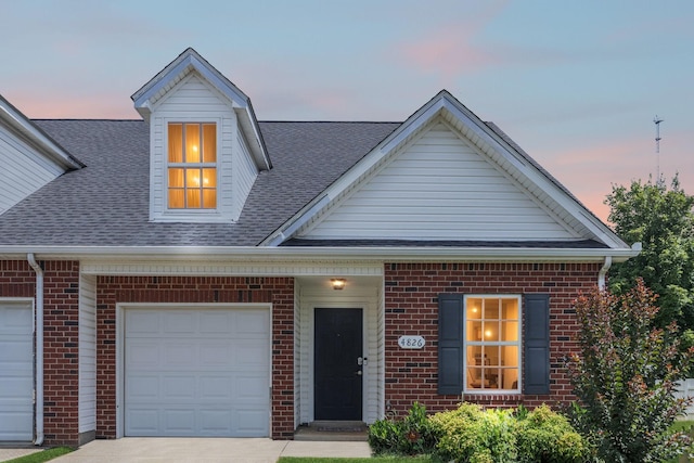 4826 Chelanie Cir, Murfreesboro, TN 37129 - view of front of home featuring brick siding, roof with shingles, and concrete driveway