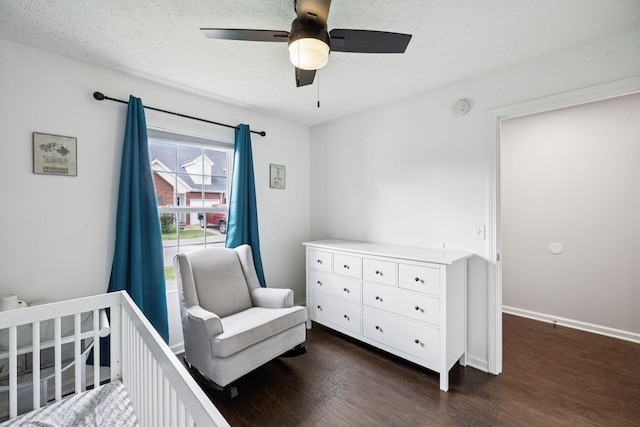 4826 Chelanie Cir, Murfreesboro, TN 37129 - bedroom featuring dark wood-style floors, a nursery area, and ceiling fan
