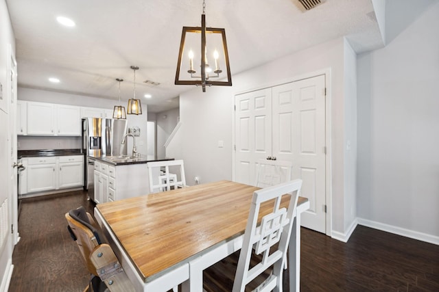 4826 Chelanie Cir, Murfreesboro, TN 37129 - dining space featuring dark wood-type flooring, a chandelier, and recessed lighting