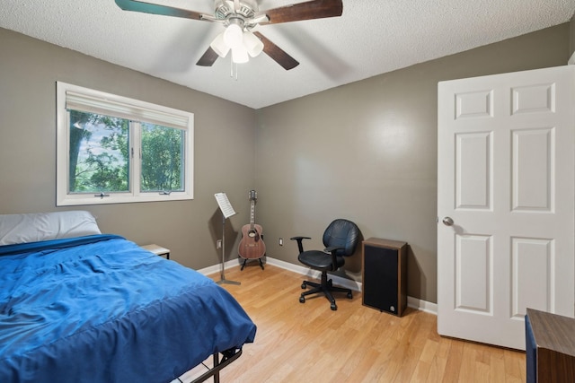 2261 High Meadow Dr, Murfreesboro, TN 37129 - bedroom with light wood-style floors, ceiling fan, and a textured ceiling