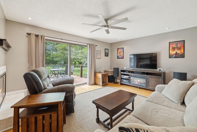 2261 High Meadow Dr, Murfreesboro, TN 37129 - living area with ceiling fan, light wood finished floors, a textured ceiling, and recessed lighting