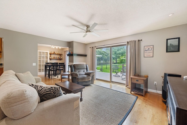 2261 High Meadow Dr, Murfreesboro, TN 37129 - living area featuring a ceiling fan, light wood-style flooring, and a textured ceiling