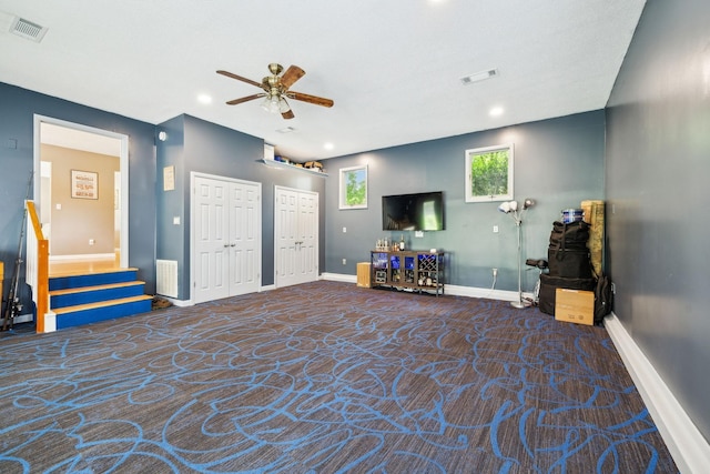 2261 High Meadow Dr, Murfreesboro, TN 37129 - living area with carpet flooring, ceiling fan, stairway, and recessed lighting