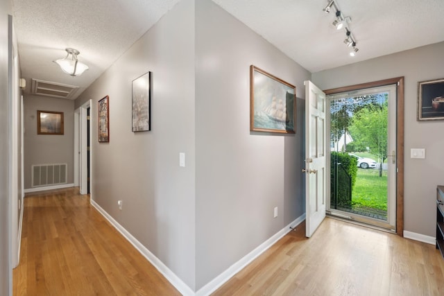 2261 High Meadow Dr, Murfreesboro, TN 37129 - entryway featuring light wood-style floors and a textured ceiling