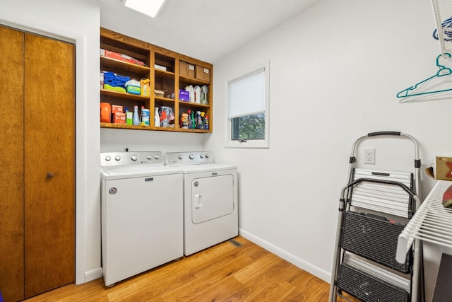 2261 High Meadow Dr, Murfreesboro, TN 37129 - washroom featuring separate washer and dryer and light wood-type flooring