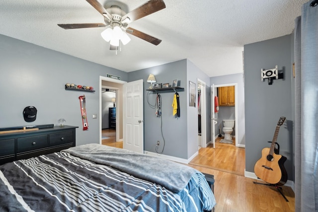 2261 High Meadow Dr, Murfreesboro, TN 37129 - bedroom featuring light wood-type flooring, a textured ceiling, ceiling fan, and ensuite bathroom