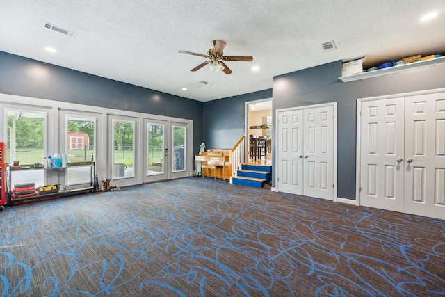 2261 High Meadow Dr, Murfreesboro, TN 37129 - living room with carpet, a ceiling fan, a textured ceiling, stairway, and recessed lighting