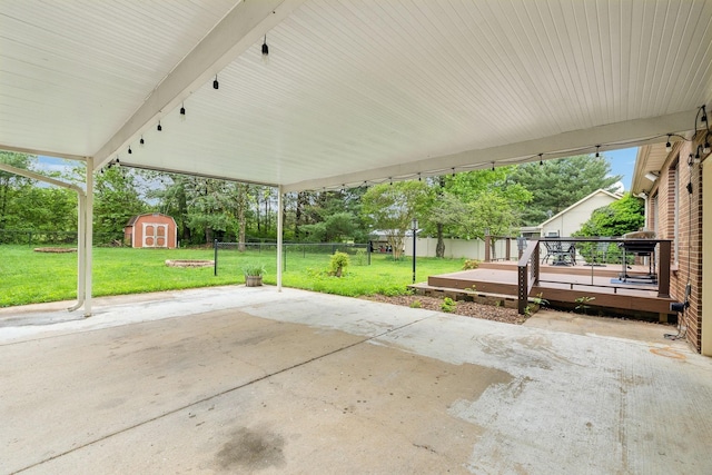 2261 High Meadow Dr, Murfreesboro, TN 37129 - fenced backyard featuring a storage shed, a patio, and a wooden deck