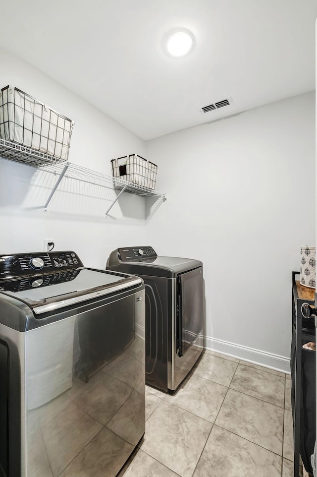 3612 Shady Forest Dr, Murfreesboro, TN 37128 - washroom featuring separate washer and dryer and light tile patterned floors