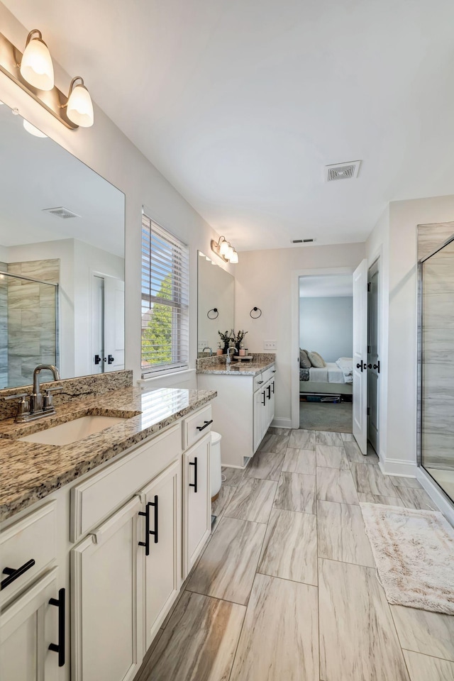 3612 Shady Forest Dr, Murfreesboro, TN 37128 - full bathroom featuring a stall shower, ensuite bathroom, two vanities, and marble look tiles