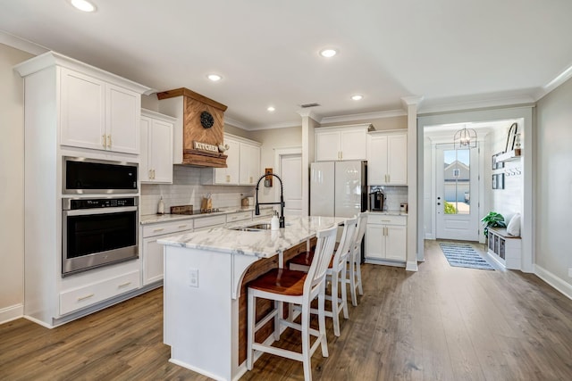 3612 Shady Forest Dr, Murfreesboro, TN 37128 - kitchen featuring stainless steel appliances, crown molding, white cabinets, decorative backsplash, and dark wood finished floors