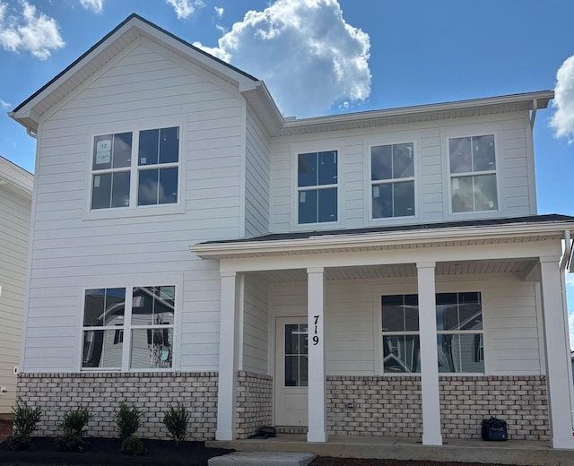 719 Walleye Way, Antioch, TN 37013 - view of front facade with brick siding and covered porch