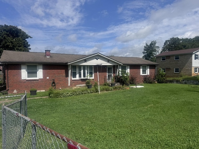502 Woodbury Dr, Clarksville, TN 37042 - ranch-style home with brick siding, a chimney, and roof with shingles