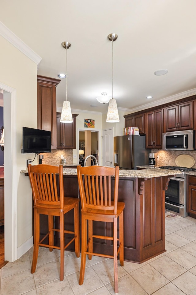 835 Banner Dr, Murfreesboro, TN 37129 - kitchen with ornamental molding, backsplash, appliances with stainless steel finishes, a breakfast bar area, and light stone counters