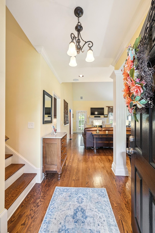 835 Banner Dr, Murfreesboro, TN 37129 - entrance foyer featuring a chandelier, wood finished floors, crown molding, stairway, and ornate columns