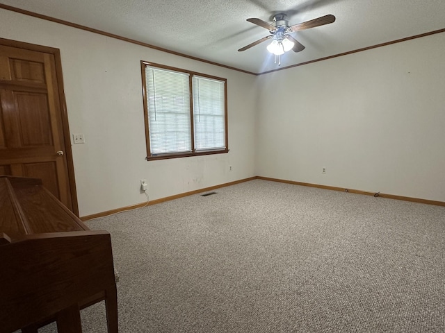 638 Chitwood Dr, Lafayette, TN 37083 - unfurnished room featuring ornamental molding, a ceiling fan, light carpet, and a textured ceiling