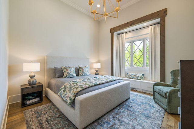 8524 Heirloom Blvd, College Grove, TN 37046 - bedroom featuring crown molding, a chandelier, and wood finished floors