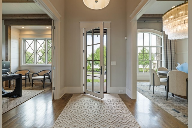 8524 Heirloom Blvd, College Grove, TN 37046 - foyer entrance featuring healthy amount of natural light, dark wood-type flooring, a chandelier, and beam ceiling