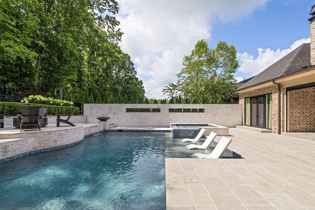 8524 Heirloom Blvd, College Grove, TN 37046 - view of swimming pool with an in-ground hot tub and a patio area