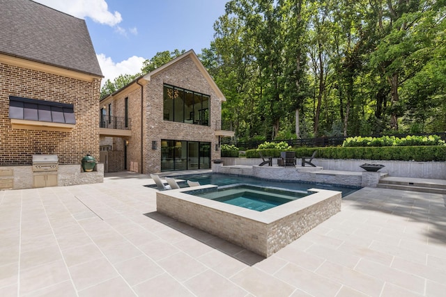 8524 Heirloom Blvd, College Grove, TN 37046 - view of pool featuring a patio area, area for grilling, and a pool with connected hot tub
