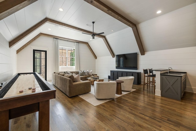 8524 Heirloom Blvd, College Grove, TN 37046 - living area with dark wood-style floors, wooden walls, and a ceiling fan