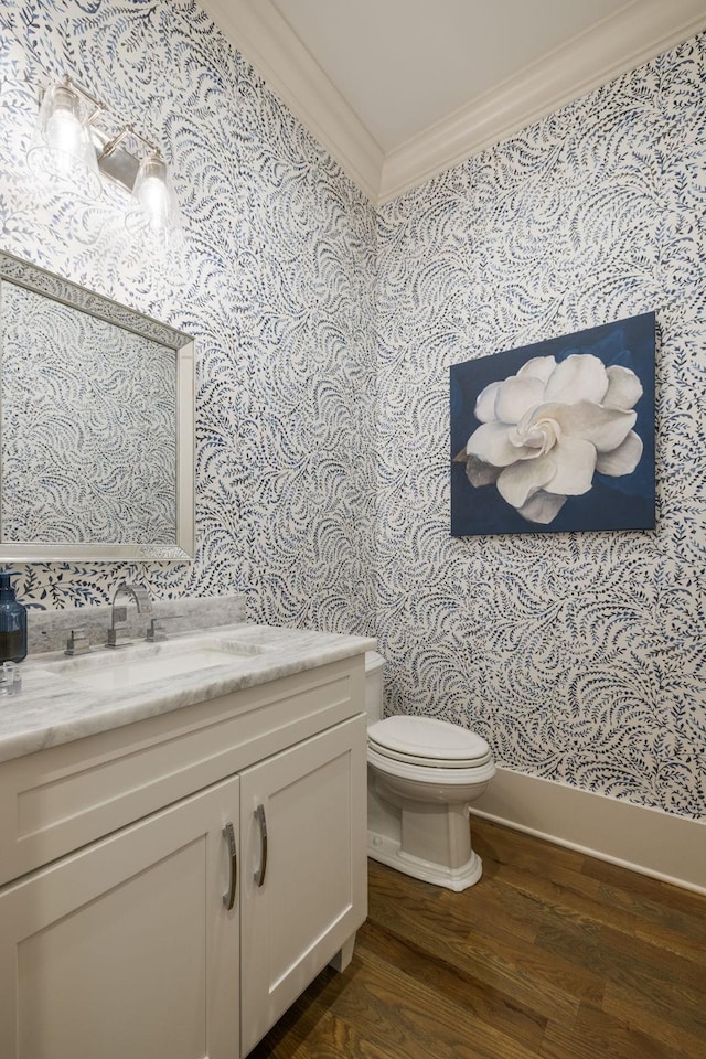 8524 Heirloom Blvd, College Grove, TN 37046 - half bathroom featuring crown molding, wallpapered walls, wood finished floors, and vanity