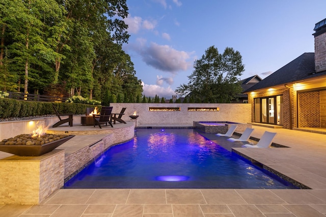 8524 Heirloom Blvd, College Grove, TN 37046 - view of pool featuring an outdoor fire pit, a patio, french doors, and a fenced backyard