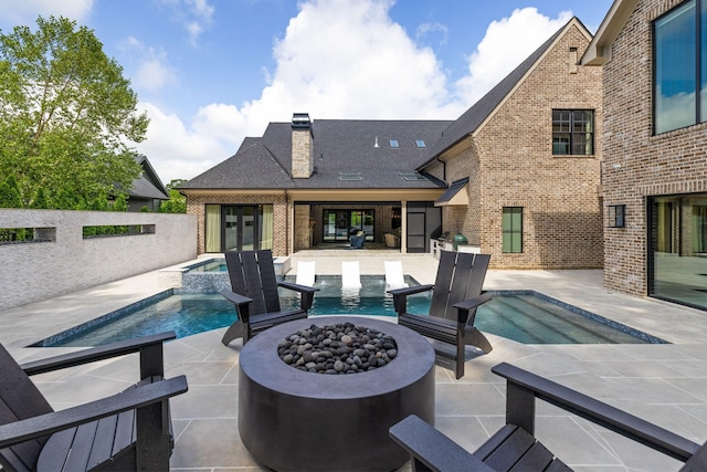 8524 Heirloom Blvd, College Grove, TN 37046 - view of swimming pool featuring an outdoor fire pit, a patio area, and a pool with connected hot tub