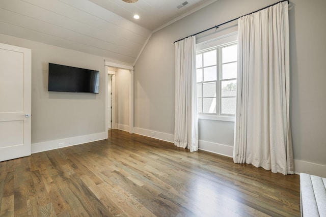 8524 Heirloom Blvd, College Grove, TN 37046 - spare room featuring vaulted ceiling and wood finished floors