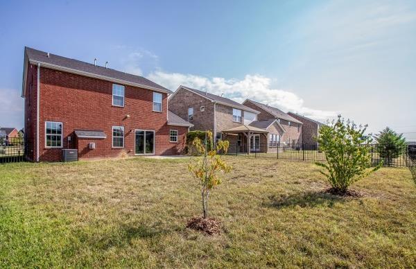 107 Clavie Crew Ln, Spring Hill, TN 37174 - back of house with brick siding