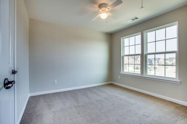 107 Clavie Crew Ln, Spring Hill, TN 37174 - empty room with carpet floors and ceiling fan