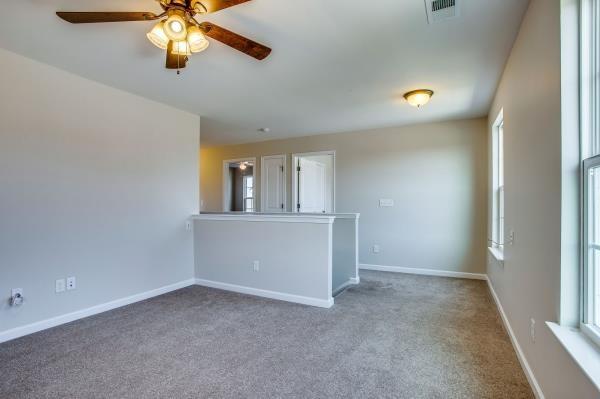 107 Clavie Crew Ln, Spring Hill, TN 37174 - empty room featuring carpet and ceiling fan