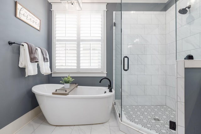 212 Rich Cir, Franklin, TN 37064 - full bath featuring a freestanding tub, marble finish flooring, and a stall shower