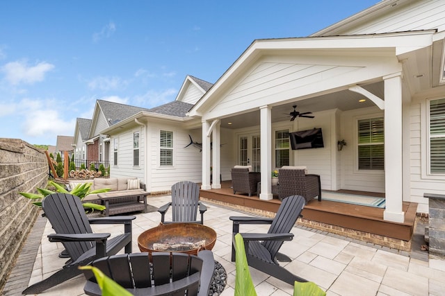 212 Rich Cir, Franklin, TN 37064 - fenced backyard featuring a patio area, a ceiling fan, and an outdoor living space with a fire pit