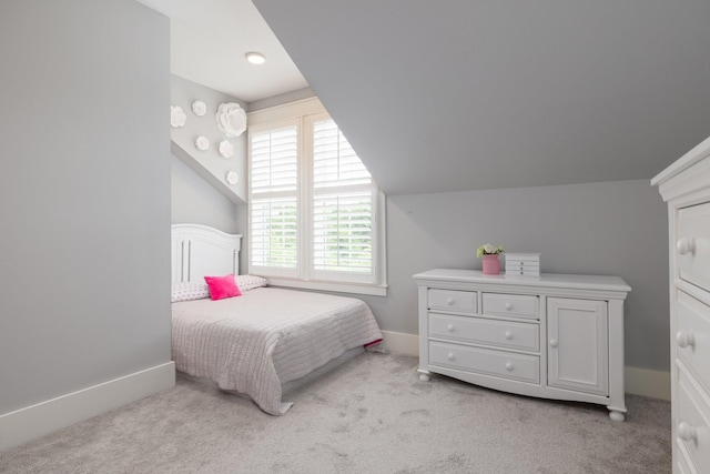 212 Rich Cir, Franklin, TN 37064 - carpeted bedroom with lofted ceiling and baseboards