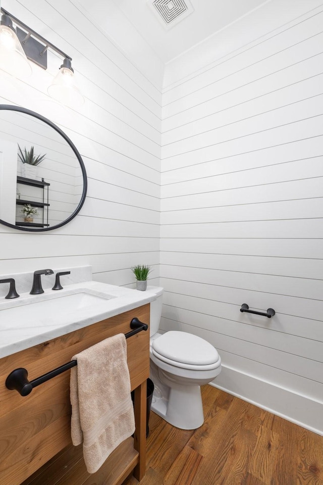 212 Rich Cir, Franklin, TN 37064 - bathroom with vanity, wood finished floors, and wood walls