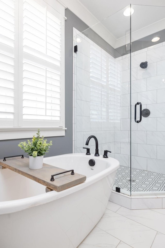 212 Rich Cir, Franklin, TN 37064 - bathroom with a soaking tub, a shower stall, and marble finish floors