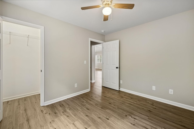 92 Defeated Creek Hwy, Carthage, TN 37030 - unfurnished bedroom featuring wood finished floors and ceiling fan