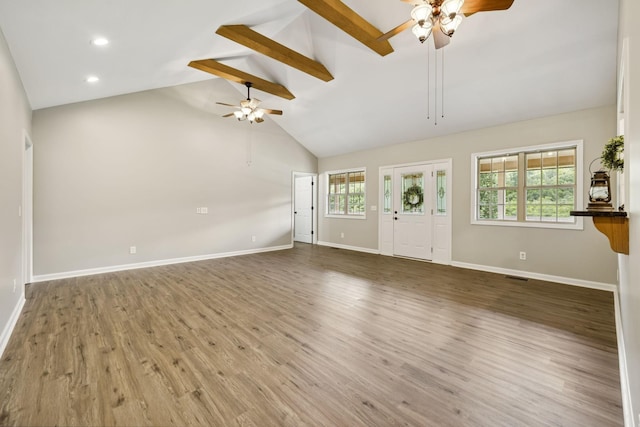 92 Defeated Creek Hwy, Carthage, TN 37030 - unfurnished living room with a ceiling fan, beamed ceiling, wood finished floors, recessed lighting, and high vaulted ceiling
