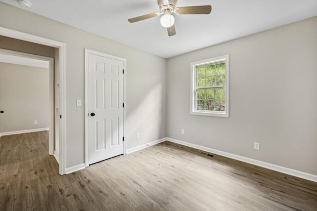 92 Defeated Creek Hwy, Carthage, TN 37030 - unfurnished bedroom featuring wood finished floors and a ceiling fan