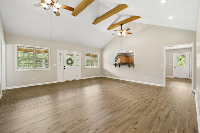 92 Defeated Creek Hwy, Carthage, TN 37030 - unfurnished living room featuring ceiling fan, high vaulted ceiling, healthy amount of natural light, wood finished floors, and recessed lighting