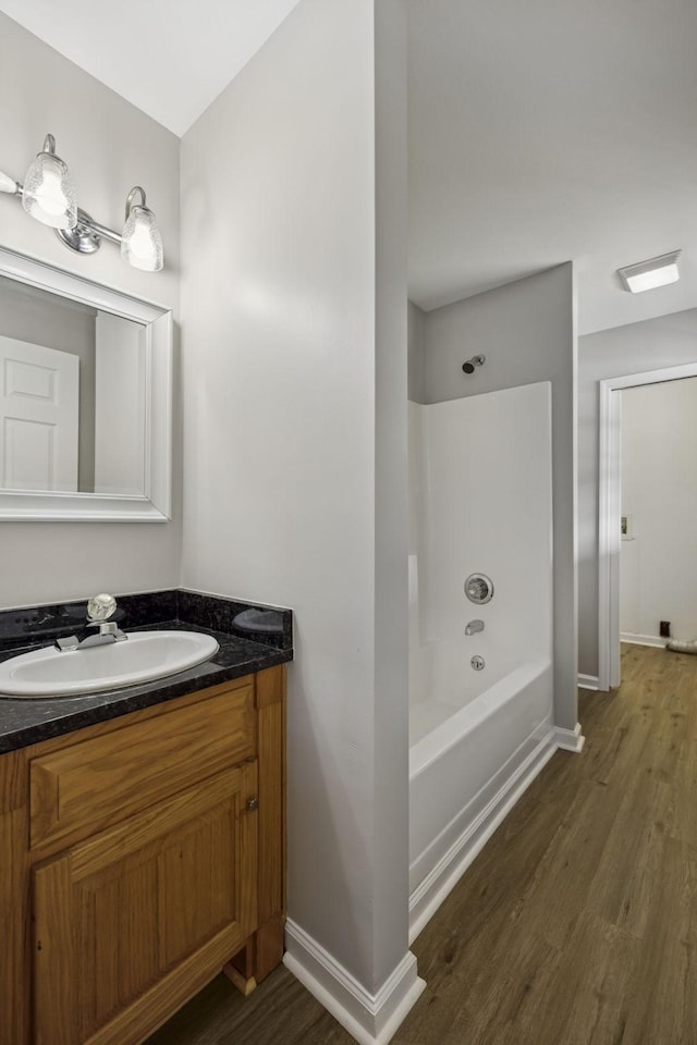 92 Defeated Creek Hwy, Carthage, TN 37030 - bathroom with wood finished floors, vanity, and shower / washtub combination