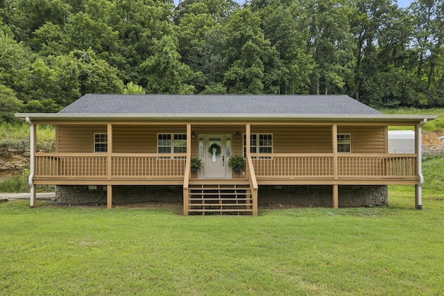 92 Defeated Creek Hwy, Carthage, TN 37030 - view of front of house with a front lawn, roof with shingles, log veneer siding, and a porch