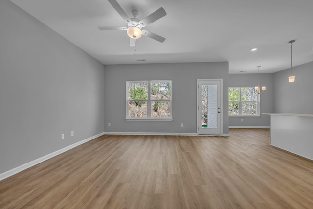 209 E Quail Hollow Way, Dickson, TN 37055 - spare room featuring a chandelier, light wood-style flooring, ceiling fan, and recessed lighting