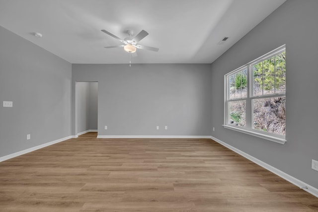 209 E Quail Hollow Way, Dickson, TN 37055 - spare room featuring a ceiling fan and light wood-style floors