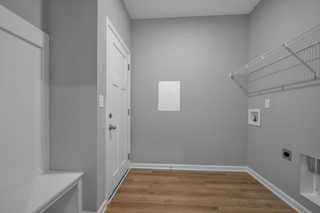209 E Quail Hollow Way, Dickson, TN 37055 - laundry area with hookup for an electric dryer, hookup for a washing machine, and light wood finished floors