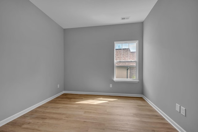 209 E Quail Hollow Way, Dickson, TN 37055 - spare room featuring baseboards and light wood-style flooring