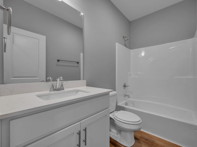 209 E Quail Hollow Way, Dickson, TN 37055 - full bath with wood finished floors, vanity, and tub / shower combination