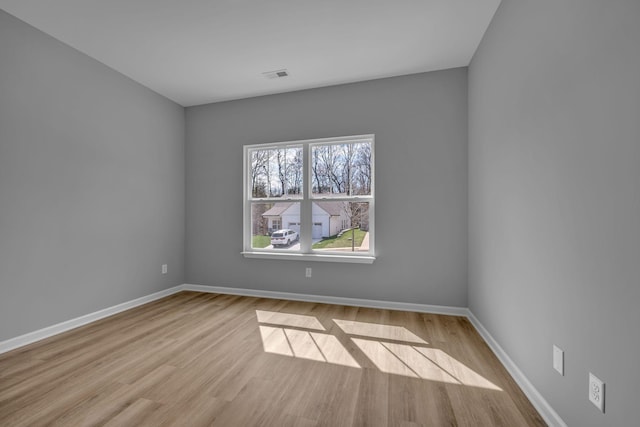 209 E Quail Hollow Way, Dickson, TN 37055 - unfurnished room featuring wood finished floors and baseboards